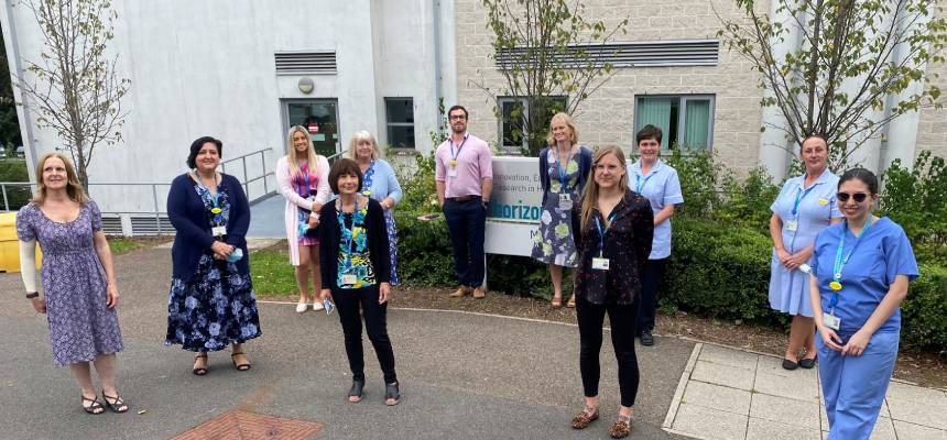 Symplify trial team pictured standing together outside the Horizon Centre at Torbay Hospital