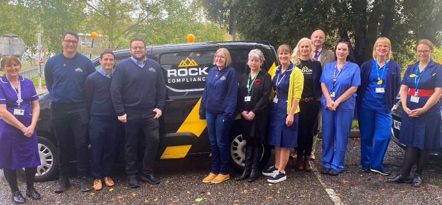Image: Torbay Hospital staff receive a generous donation from Rock Compliance team members