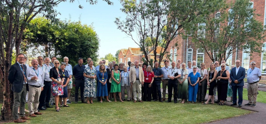 A big group of people smiling