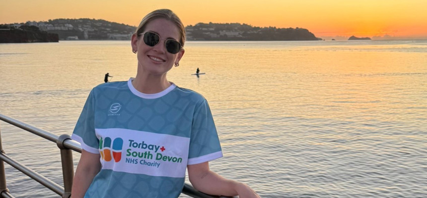 Chloe Harries with Torbay at sunset in the background