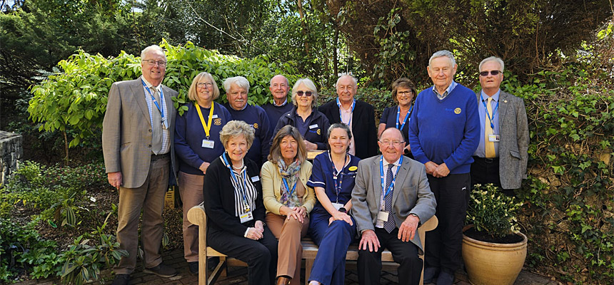 Member from the Rotary Club of Torquay and the Torbay Hospital League of Friends in the Heartease Gardens at Torbay Hospital