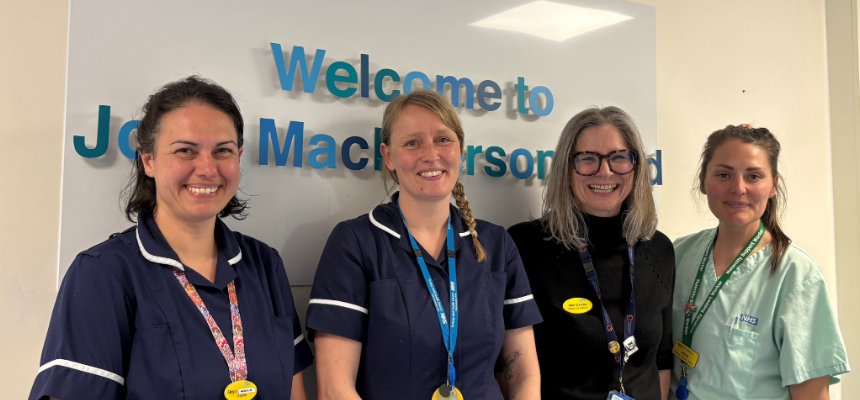 Four midwives smiling