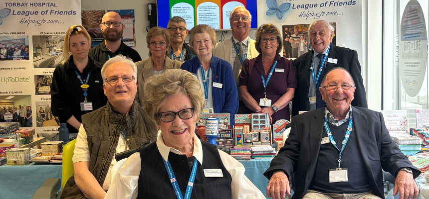 Members of the League of Friends with estates colleagues and three motorised wheelchairs