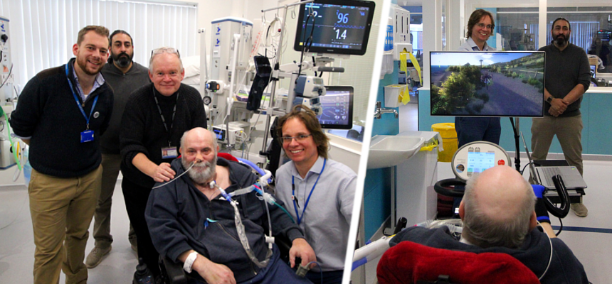 Photo: Intensive Care patient, Nick Richards with the VR Team