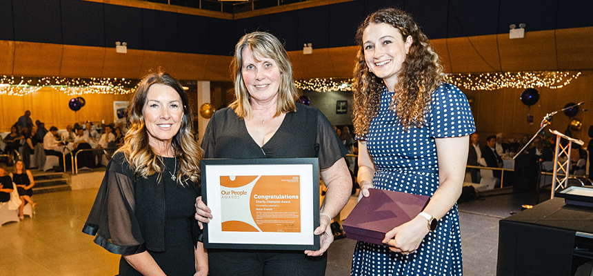 Charity Champion Award winner Helen French being presented with their award
