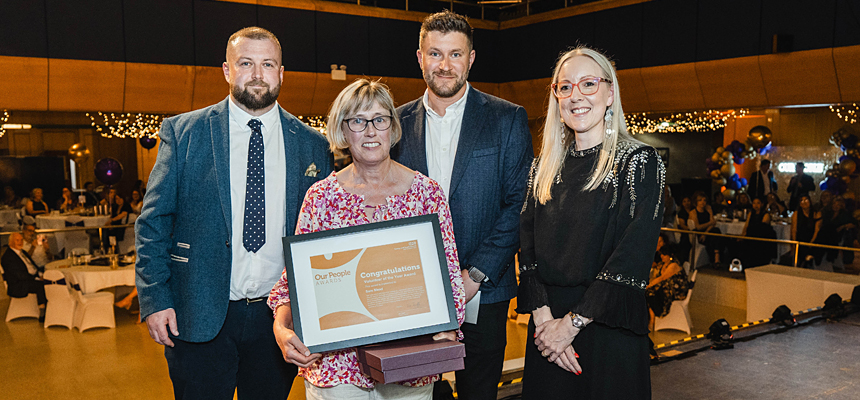 Volunteer of the Year Award winner, Sam Mead being presented with their award