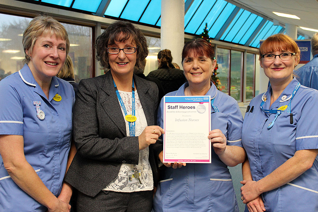 Staff from the Infusion Nurses Team with Director of Estates and Commercial Development Lesley Darke