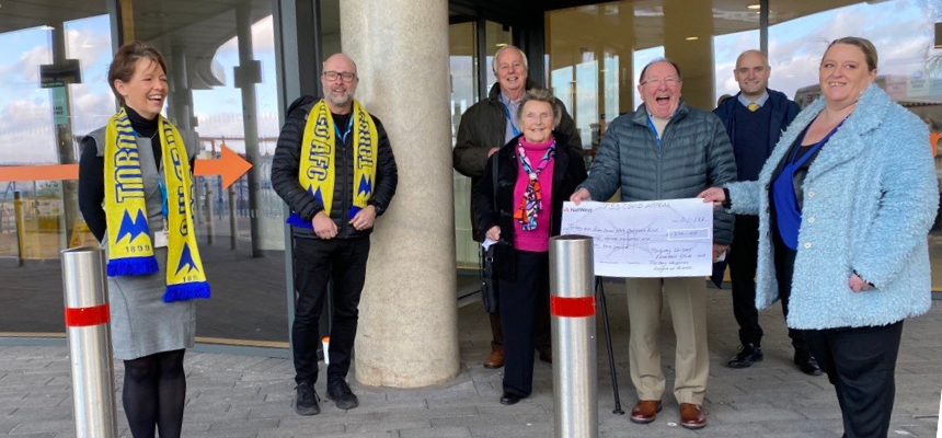 Members of Torbay Hospital LOF with donation from Torquay United AFC